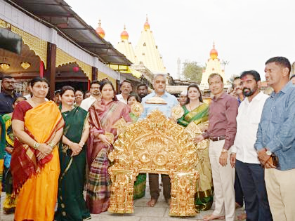 On the eve of Sharadiya Navratri festival on Wednesday, through the initiative of Karveer Niwasini Shree Ambabai Suvarna Palkhi Trust, Ambabai was offered a gold-plated Prabhawal. Today, it has come into effective use at the time of Ghatasthapana. For this, 450 grams of 24 carat gold was used.