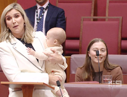 Queensland's newly elected Labor Party Senator Corinne Mulholland delivered her first speech in Parliament while holding her infant son Auggie.