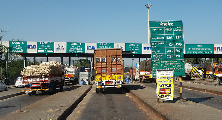If a 10-meter-wide two-lane road is to be repaired and converted into 4 lanes, the toll rates will be halved.